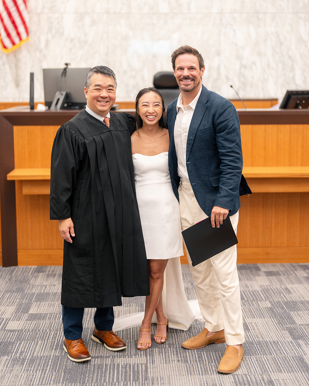 Jane Ko and Josh Campbell and Judge Wong at Travis County Civil and Family Courts Facility